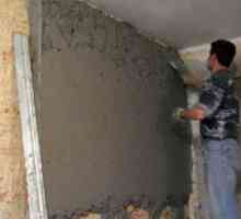 Изравняващите стени се научават как да подготвят стени за плочки